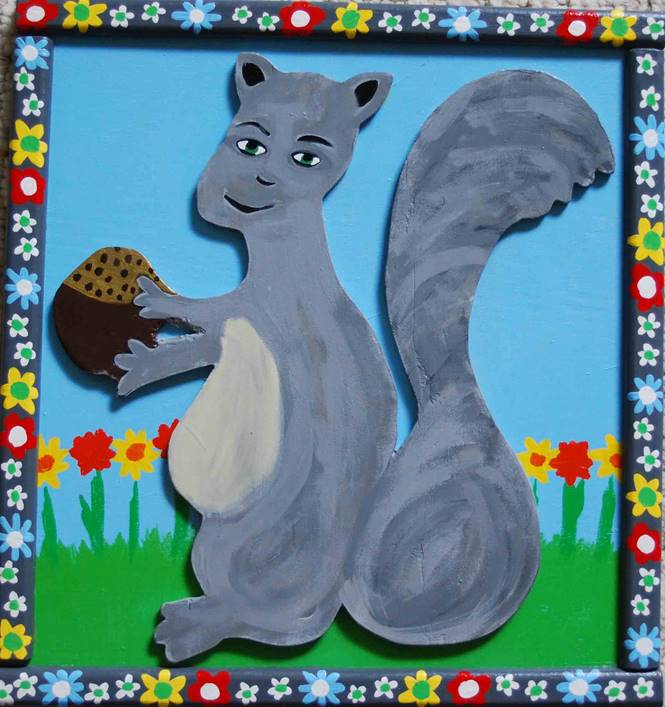 grey squirrel with flowered border for web